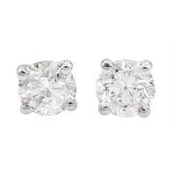 Pair of 18ct white gold round brilliant cut diamond stud earrings, total diamond weight approx 1.10 carat