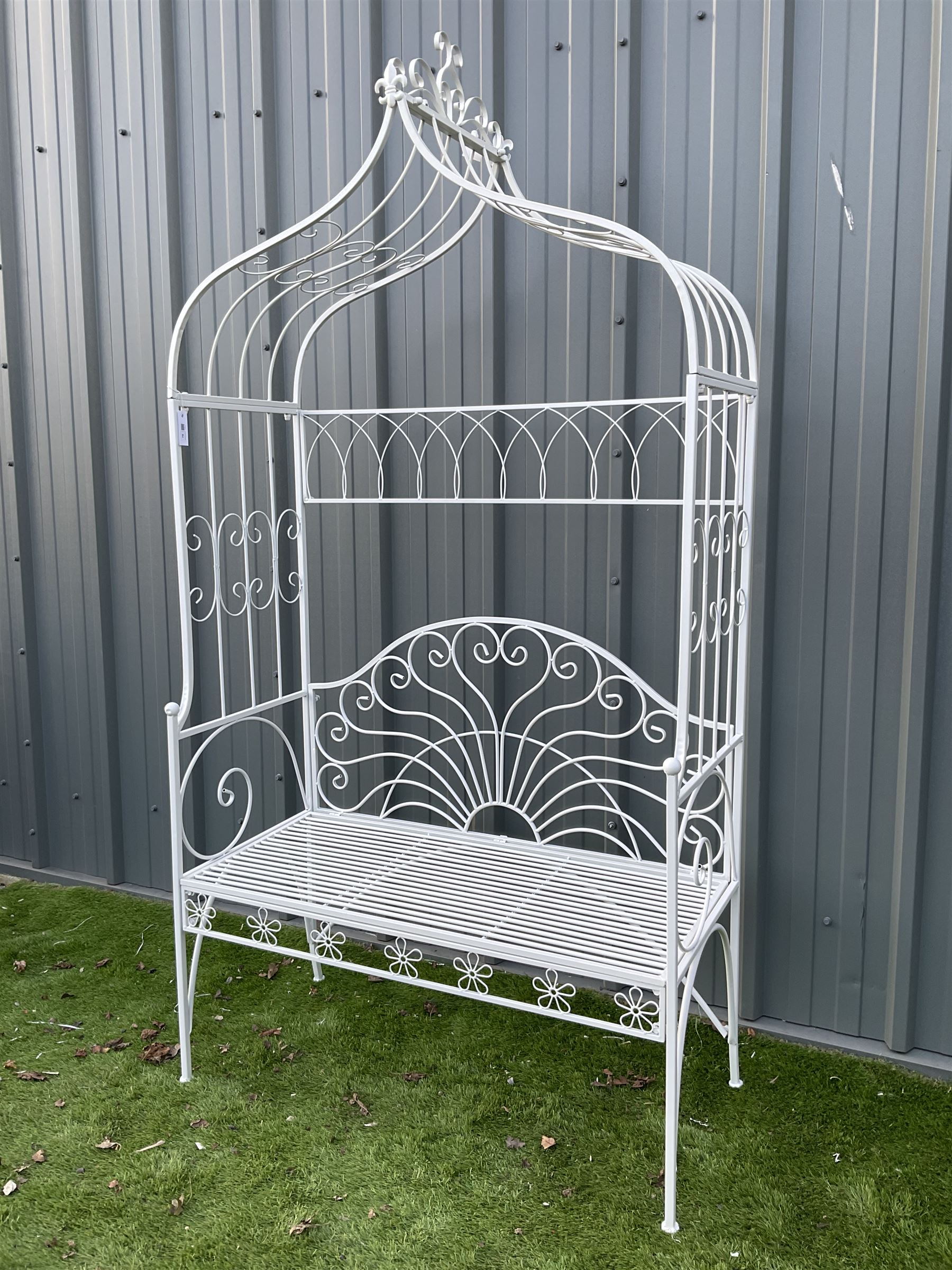 White painted metal garden arbour bench, pagoda top with sunrise back - THIS LOT IS TO BE COLLECTED BY APPOINTMENT FROM DUGGLEBY STORAGE, GREAT HILL, EASTFIELD, SCARBOROUGH, YO11 3TX