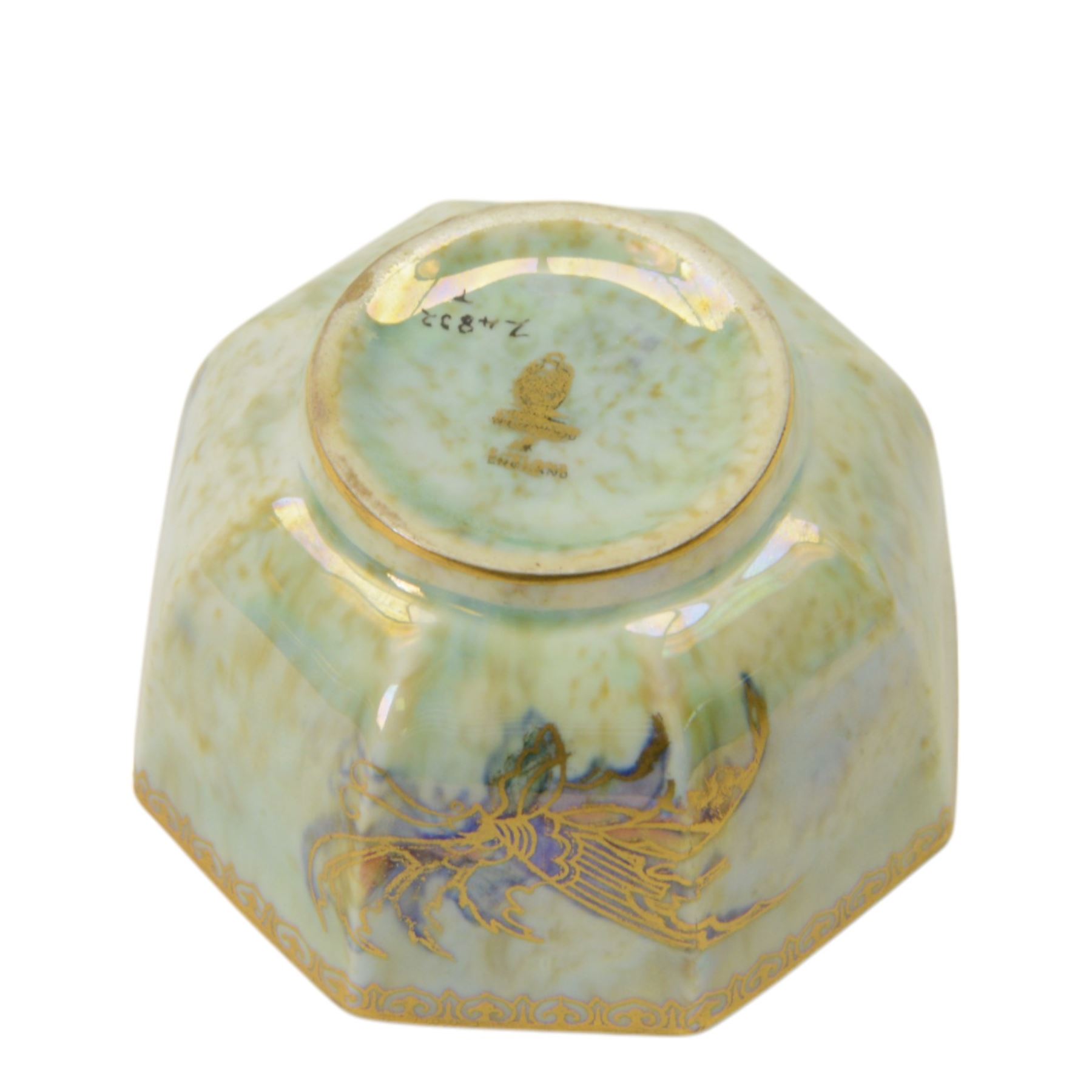 Wedgwood Fairyland lustre bowl, of octagonal form with gilt butterflies on a mottled pale green ground, with mottled orange interior and printed mark beneath, W9cm, H5cm