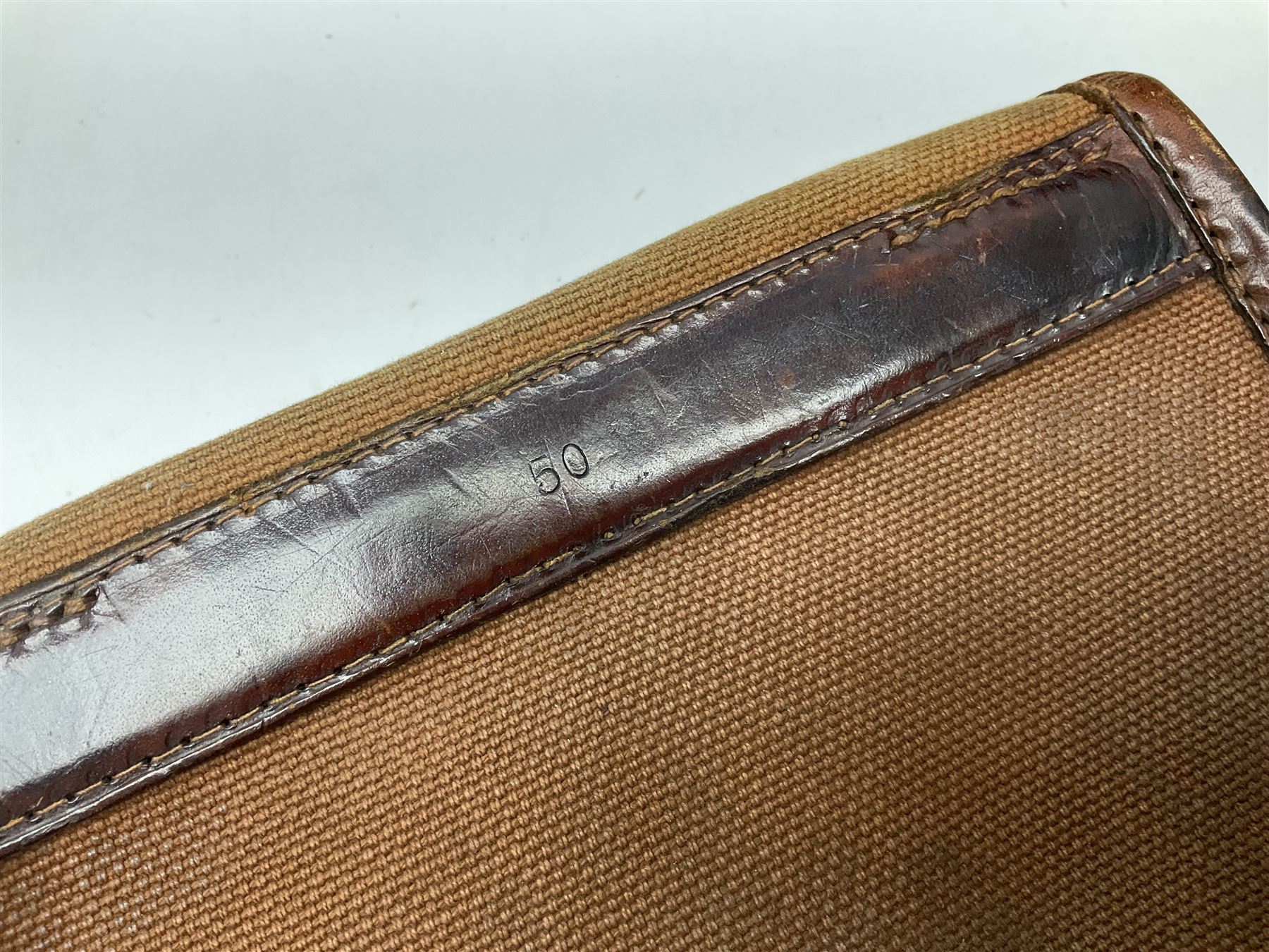 Miscellaneous shooting accessories - W.J. Bowman & Sons clay pigeon launcher; two leather cartridge belts; three cartridge bags; two canvas/leather game bags; and two metal/wooden cartridge boxes
