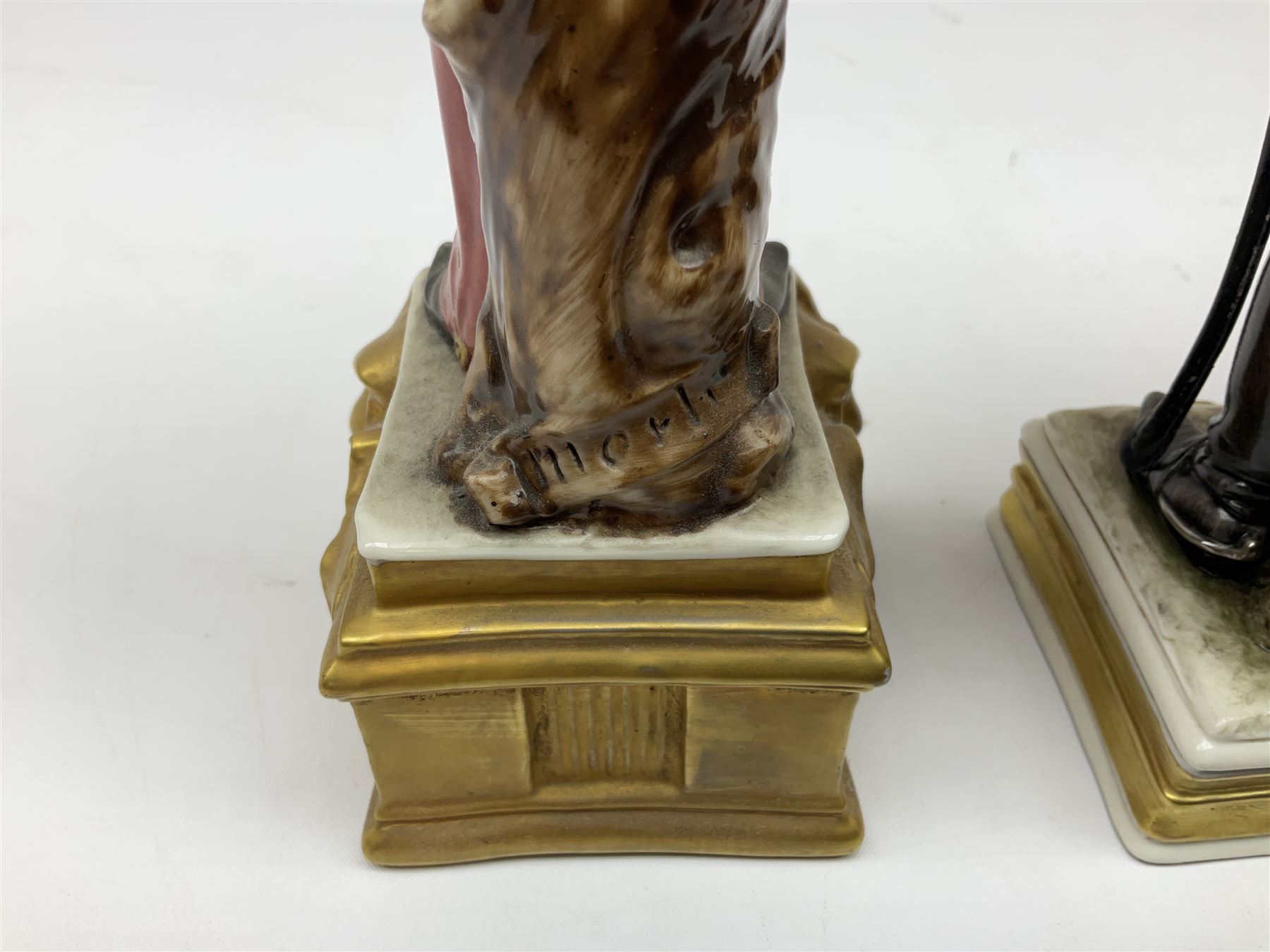 Group of seven Capodimonte figures of soldiers, to include four Bruno-Merli examples including Officer of the 12th Lancers 1820 and Captain of the 18th Hussars 1815, both raised upon ornate gilt plinths bearing British monarch motto in Latin 'Dieu et mon droit', and three further similar, all with crowned N mark beneath, tallest H32cm