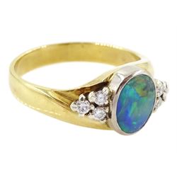 18ct gold opal and diamond ring, single oval cut opal, with three round brilliant cut diamonds set either side, stamped 750, total diamond weight approx 0.20 carat