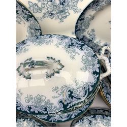 Alfred Meakin Ormonde patter dinner wares, comprising twelve dinner plates, twelve salad plates, twleve side plates, two large tureen and covers, and stands, two smaller tureen and covers and stands, and four graduated oval serving platters.  
