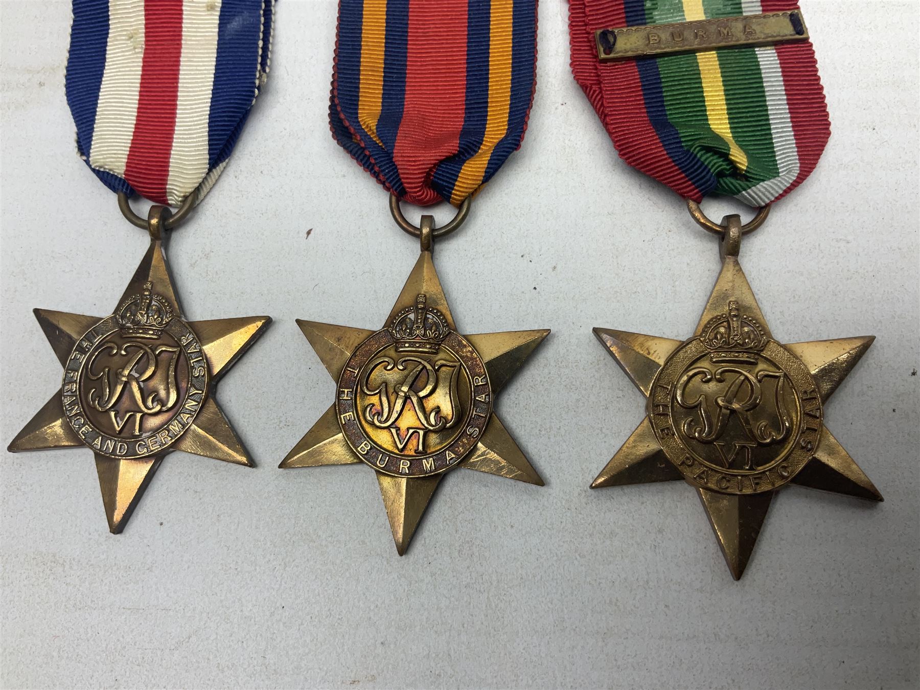 WW2 Canada Volunteer Service Medal 1939-45 with maple leaf clasp; and five WW2 Stars - Burma Star, Atlantic Star, Africa Star with 8th Army clasp, France and Germany Star and Pacific Star with Burma clasp; all with ribbons (6)