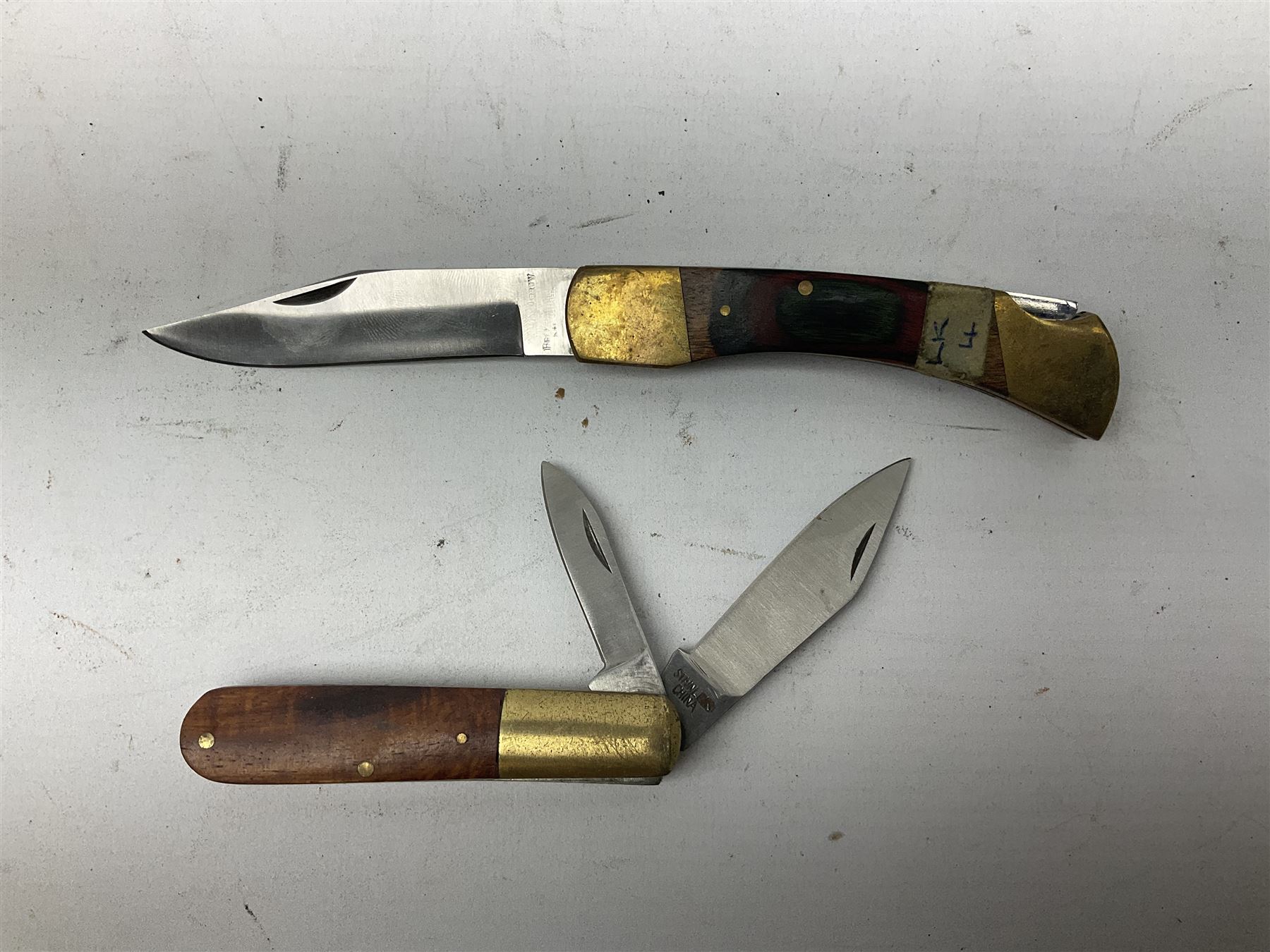 Nine pocket knives including two Ravi folding knives, Richards of Sheffield single blade folding knife etc