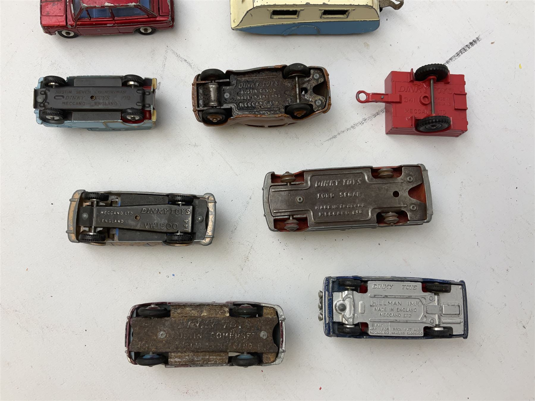 Dinky - twenty-five unboxed and playworn die-cast models including Lady Penelope FAB1, Caravan, Ford Sedan, Triumph TR2, Packard, Austin Somerset, Devon, Healey and Seven Countryman etc (25)