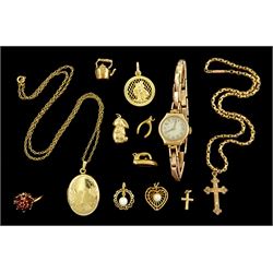 Gold jewellery including pendant /charms and a garnet cluster ring, rose gold manual wind wristwatch, on rose gold expanding bracelet, all 9ct, two 14ct gold pearl pendants an, gilt locket pendant necklace and a gilt cross pendant necklace