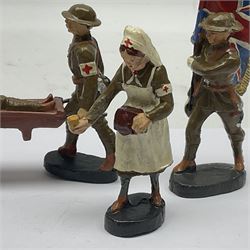 Eight Elastolin British soldiers and wartime figures, including nurse, injured soldier on stretcher, soldier with dog, etc, tallest 11cm
