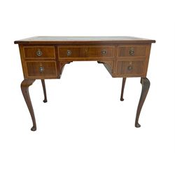 Early 20th century mahogany writing table, rectangular moulded top with inset leather, fitted with five drawers, on cabriole supports