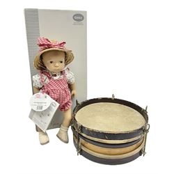 German Gotz articulated vinyl baby doll 'Claire' c1997 with original clothing, hat and labels; artist designed by Sylvia Natterer H35cm; boxed; and small child's wooden cased drum (2)