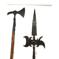 Large continental steel halberd axe the engraved blade with cast sunburst centre and long studded ash handle L219cm; and another halberd with plain ribbed blade and studded ash handle with ground spike (2)