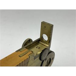 Late 19th/early 20th century boxwood and brass clinometer rule by Stanley, with inset magnetic compass, screw action protractor hinge divided to one degree with rise in inches per yard scale under, spirit level to one edge, marked 'W.F. Stanley Great Turnstile Holborn' with tables of distances, angles and thickness H16cm closed: in original leather covered case with instructions