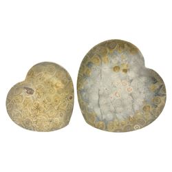 Two graduating fossilised coral dish in the form of hearts, largest D16cm