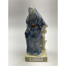 Late 18th century Prattware figure representing Charity, modelled as a mother with baby in her arms and two small children clutching at her robes, upon a square base, overall H21cm.