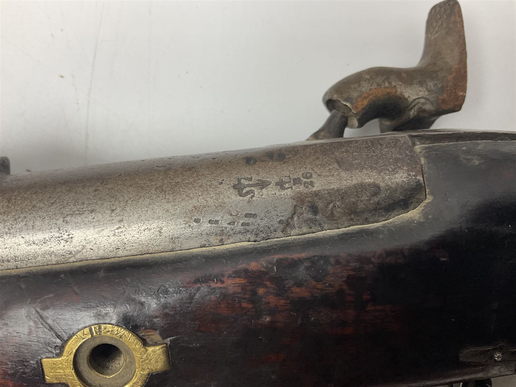 19th century Indian .577 Enfield muzzle loading rifle, proofed for 26-bore, the 98.5cm barrel with three barrel bands and later ram rod L140cm overall; 19th century Belgian side-by-side double barrel percussion shotgun, approximately 20-bore, with 74cm barrels and studded walnut stock, lock plate marked 'Liege 1868' and 'V. Gulikers-Maquinay' L117cm overall; and another side-by-side double barrel shotgun by Smythe with underlever opening (3)