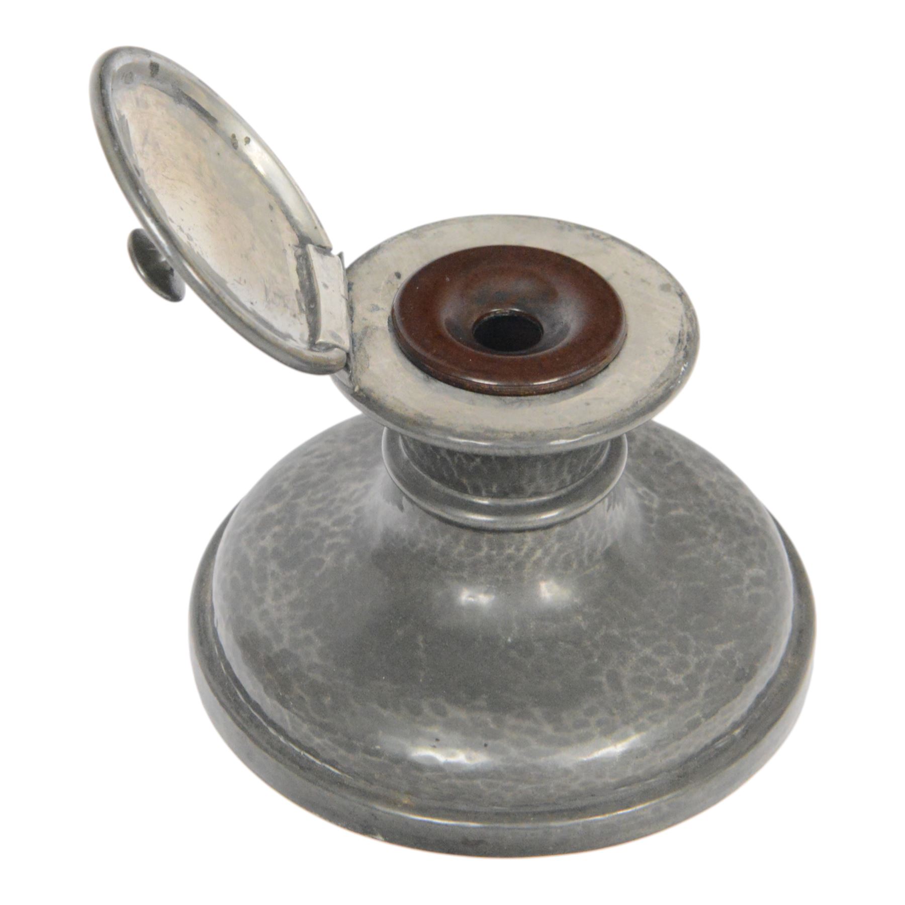 Liberty Tudric pewter ink well, the hinged lid opening to reveal original bakelite liner, stamped marks to base Tudric English Pewter Liberty & Co 01135