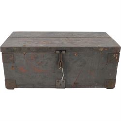 Two gas masks, together with a green tin helmet, cased within a wooden box with hinged lid 