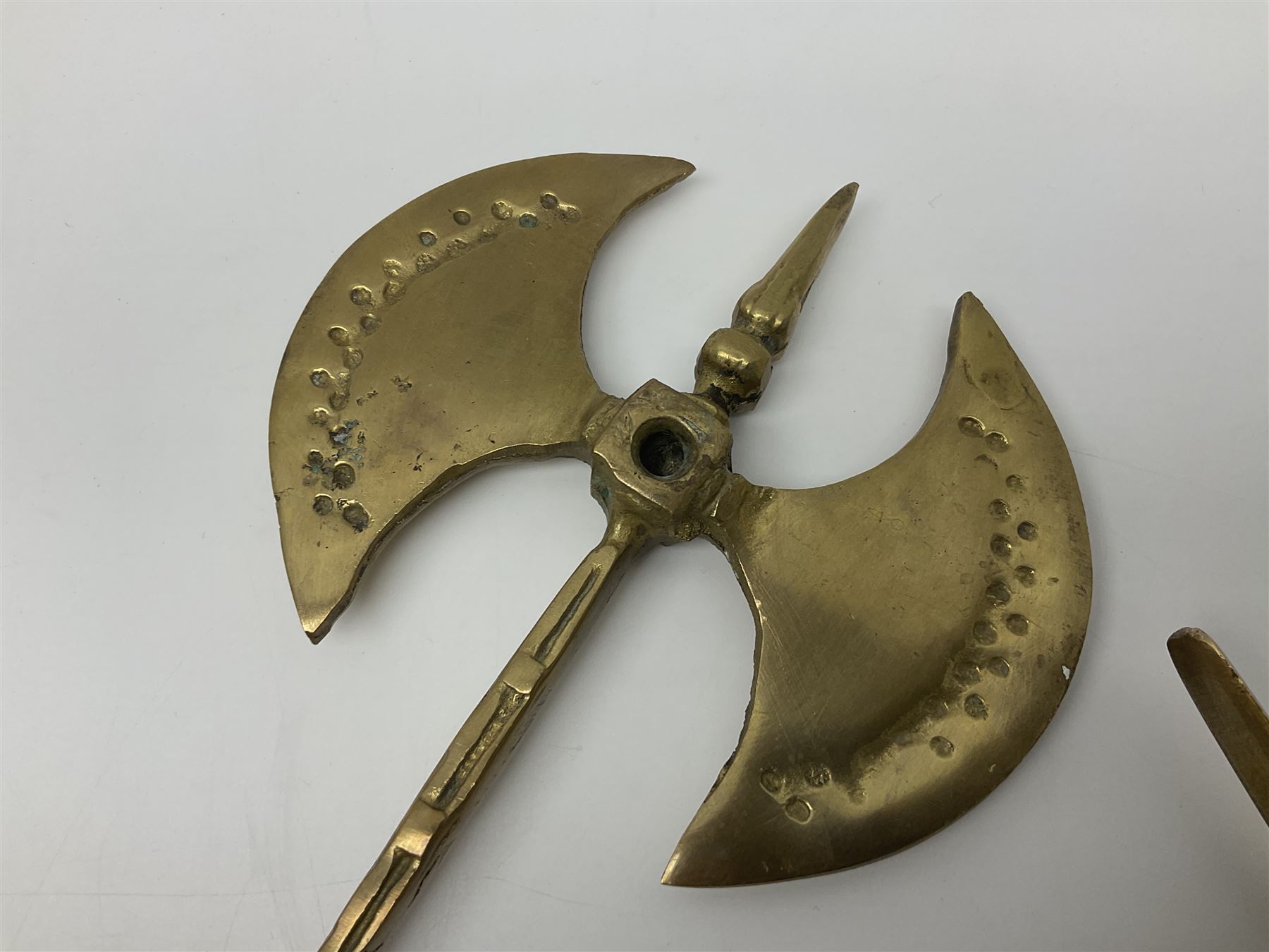 Ornamental cast-brass double-headed axe, together with another similar, H44cm