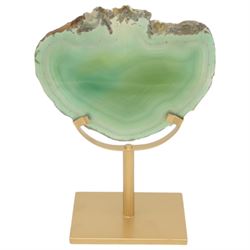 Pair of green agate slices, polished with rough edges raised upon gilt metal stands, H21cm