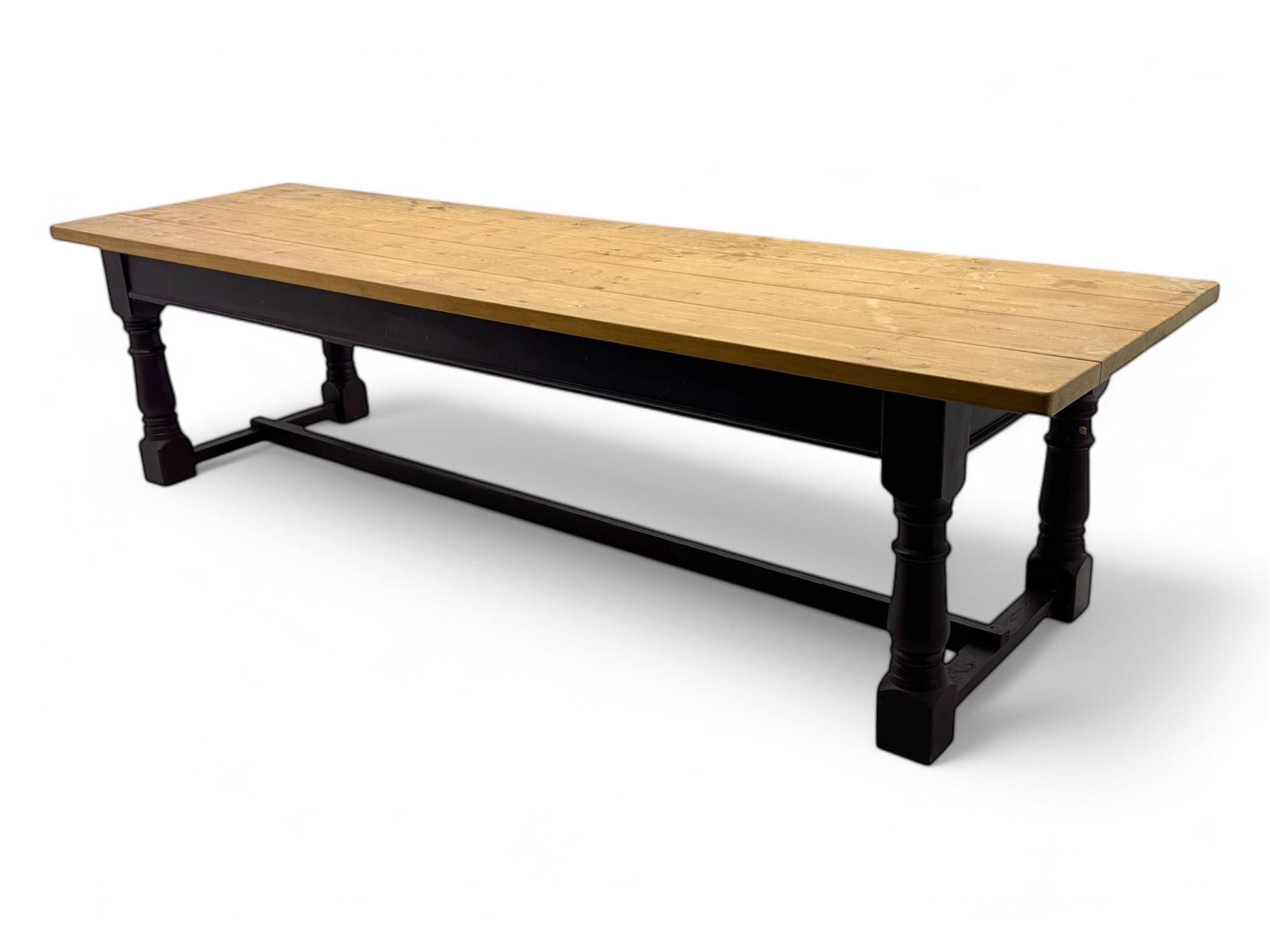 Late 20th century substantial pine refectory table, rectangular four-plank top over an indigo painted base featuring turned supports united by box stretchers