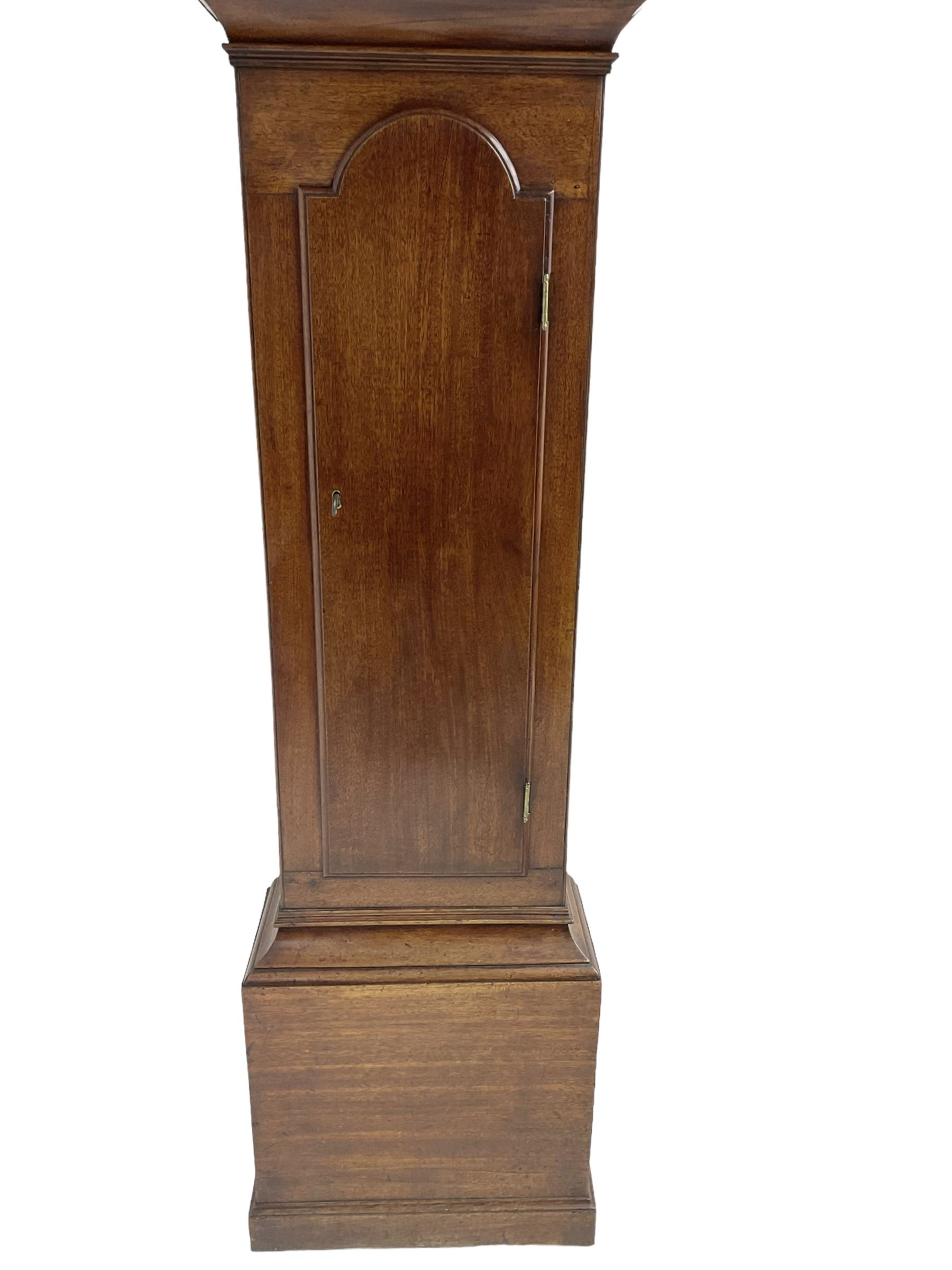 G Fortier of Sittingborn - Early 19th century 8-day mahogany longcase clock c1825, with a break arch pediment and hood door flanked by reeded pilasters with brass capitals, plain case with a long trunk door with a conforming break arch top, plinth with applied skirting, painted dial with upright Arabic numerals, date  and seconds dials, floral spandrels and a rural depiction of a country house and river to the arch, replacement steel hands with brass pointers to the calendar and seconds dials, dial pinned directly to a rack striking movement. With weights, pendulum and winding key.