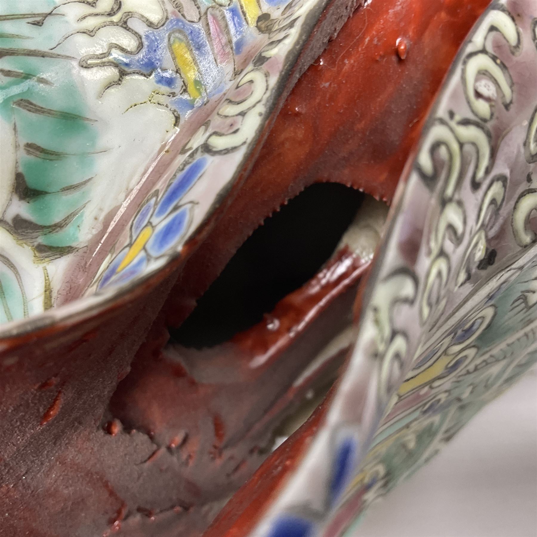 Chinese Republic Period porcelain figure, modelled as Shoulao, wearing elaborately enamelled robes decorated with peaches and flower heads, with impressed mark beneath, H55cm