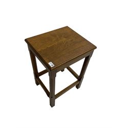Lizardman - oak occasional or lamp table, rectangular moulded top on chamfered supports, joined by stretchers, carved with lizard signature, by Derek Slater, Crayke 