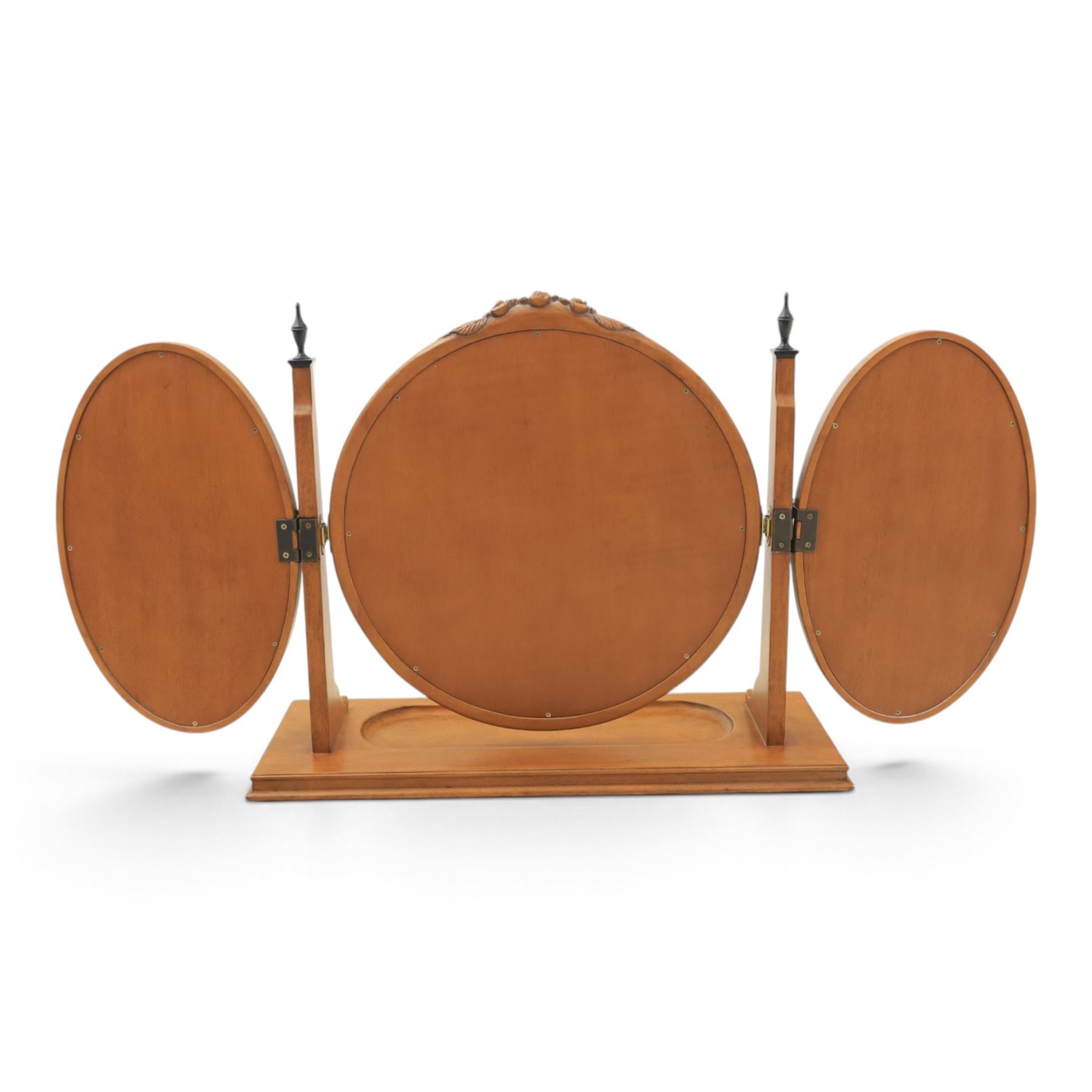 And So To Bed - 'Louis XV' triple dressing table mirror, central circular bevelled mirror, enclosed by parcel gilt with carved edge, flanked by two oval mirrors, the base with a well for trinkets 