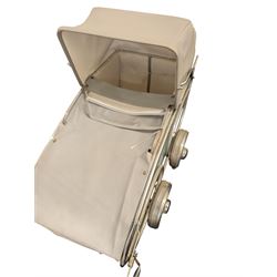 Mid 20th century Dutch baby pram/stroller, with wooden teal sides and chrome chassis, with retailers label for Mors Ouderwetse Kinderwagens, handle H100cm, L130cm