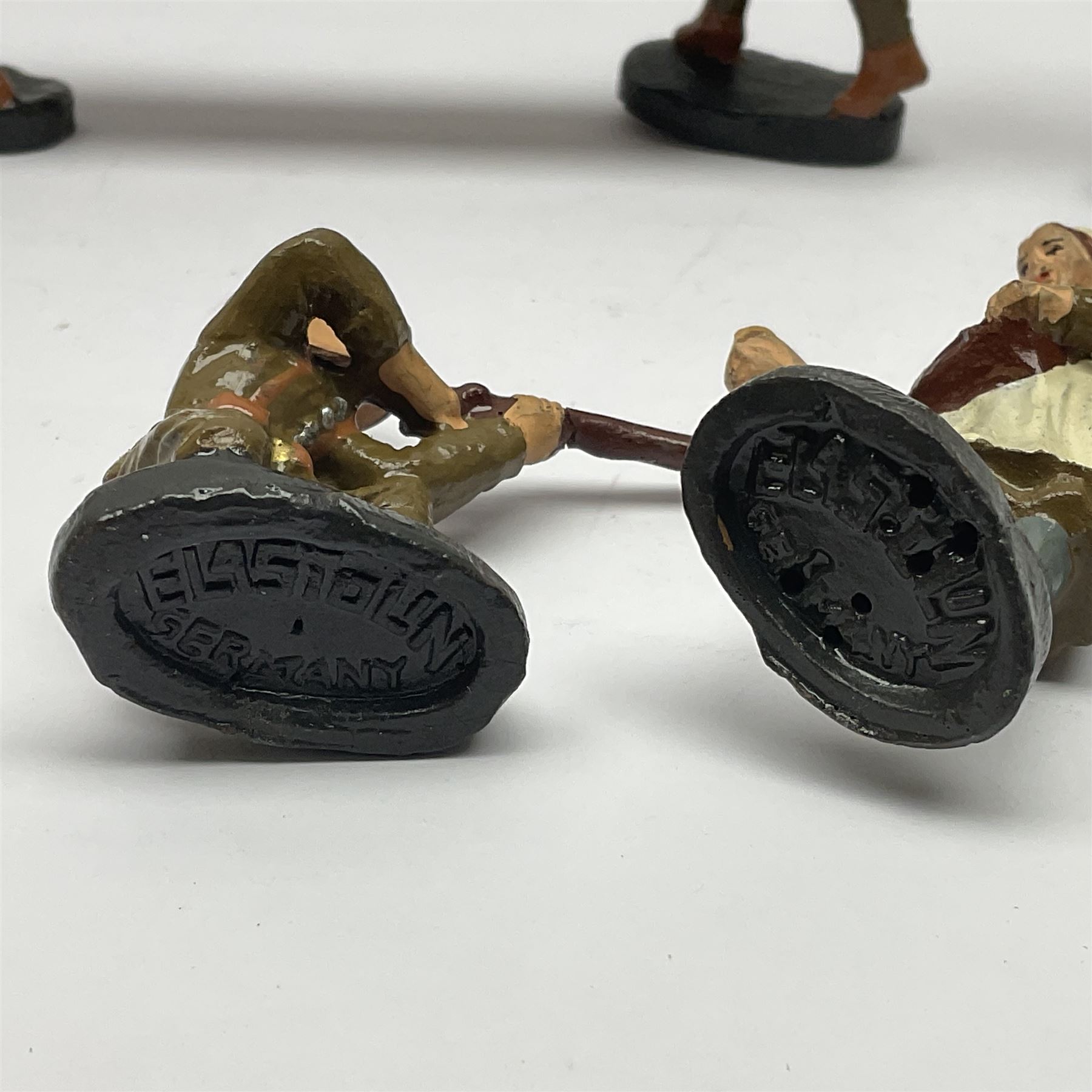 Eight Elastolin British soldiers and wartime figures, including nurse, injured soldier on stretcher, soldier with dog, etc, tallest 11cm