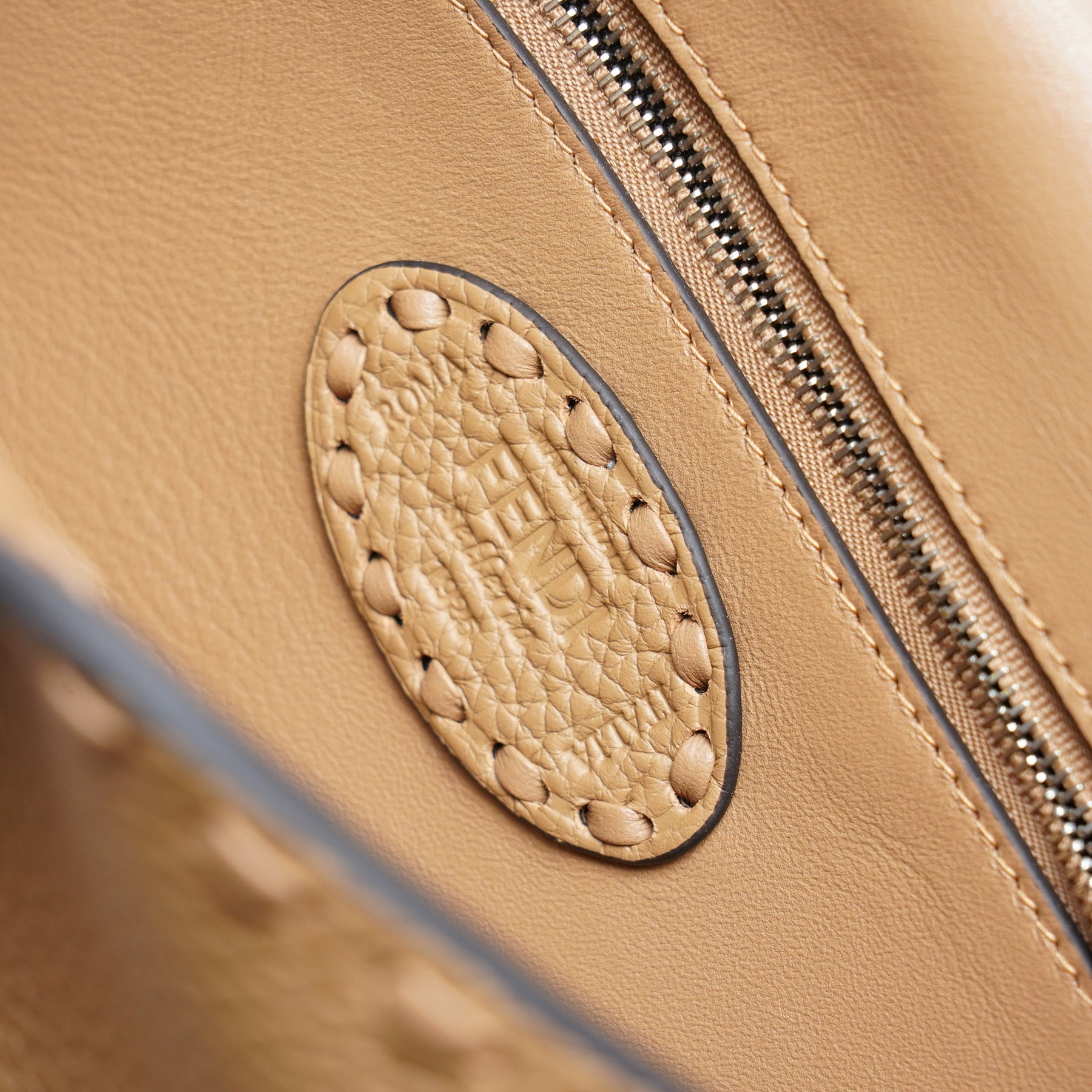 Fendi - Selleria Baguette shoulder bag, tan grained leather with hand-stitched detailing, palladium-tone FF buckle fastening, detachable leather top handle and shoulder strap, with authenticity card, dust bag and box