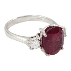 18ct white gold three stone oval cut ruby and round brilliant cut diamond ring, hallmarked, ruby approx 4.30 carat