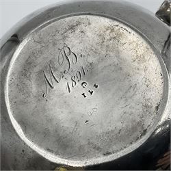 Late Victorian silver bachelors three piece tea service, comprising bullet shaped teapot, open sucrier and milk jug, each engraved with monogram surrounded by birds upon and amidst a blossoming vine, the teapot with scroll capped curved wooden handle and wooden finial to cover, hallmarked Wakely & Wheeler, London 1890, teapot including handle H12cm, sucrier H5.5cm 