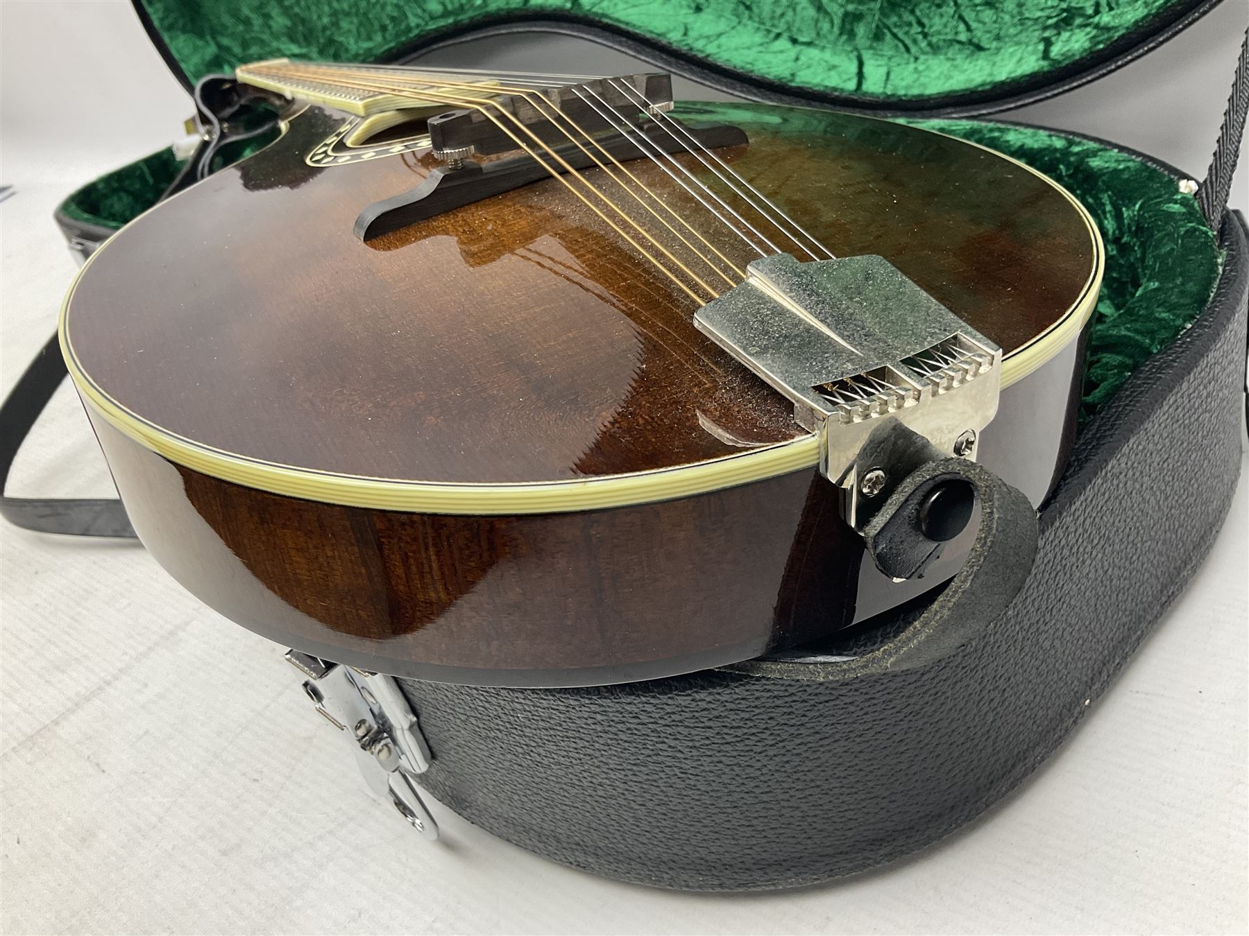 Eastman eight-string mandolin model MD504, serial no.140435406, L66cm; in TGI hard carrying case; together with case of instructional CDs