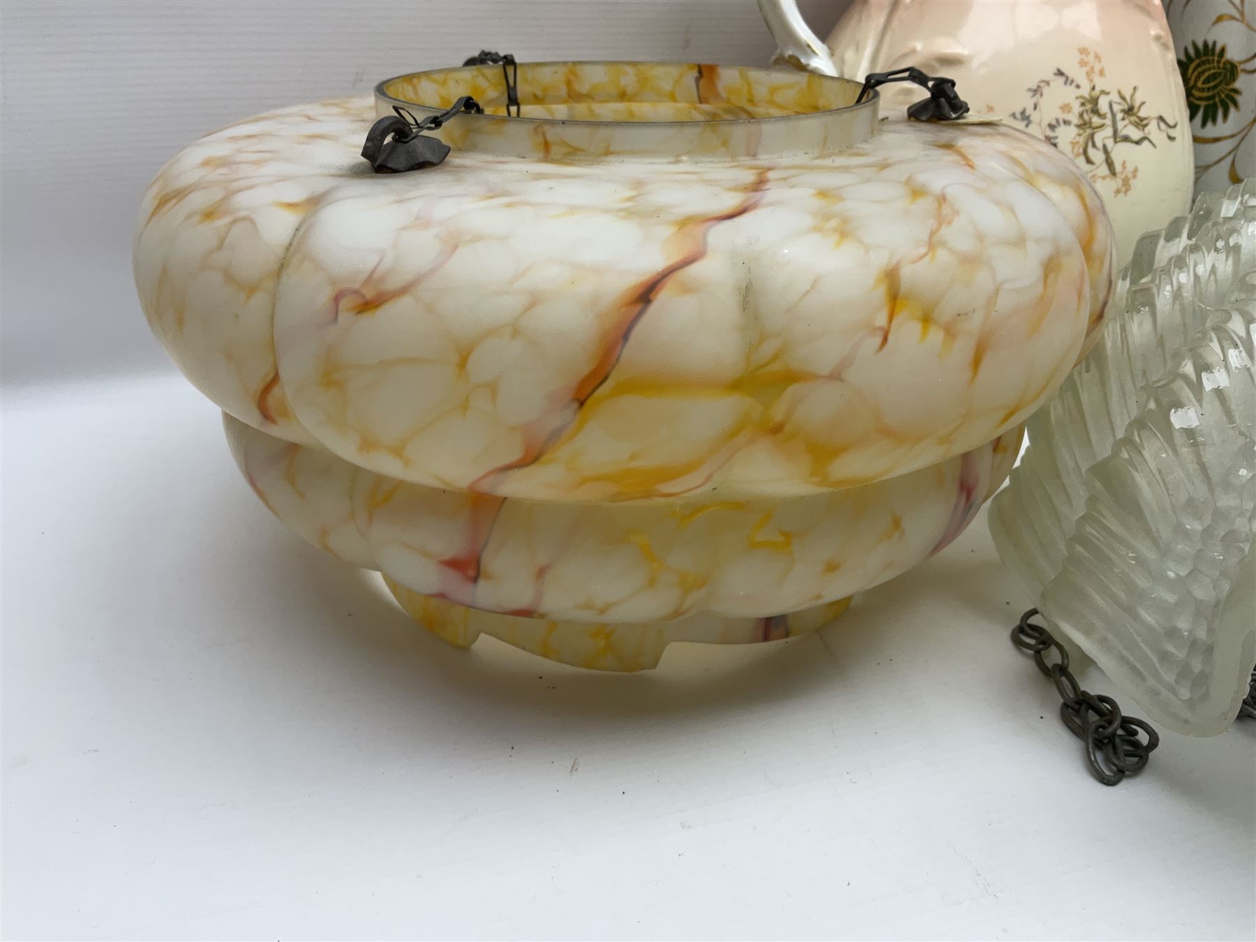 Two Art Deco mottled glass fly catcher ceiling light shades, together with two other 1930s moulded glass ceiling light shades and two Victorian style wash jugs, largest shade D33cm