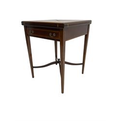 Edwardian mahogany envelope card table, four hinged square top with satinwood and ebony stringing, opening to reveal inset baize centre, fitted with single drawer, raised on square tapering supported united by waived X-stretcher