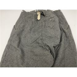 Pair of WW2 German Other Ranks trousers c1940-42, stamped C.& A. Brenninkmeyer Workstatten; WW2 German Army webbing belt with steel 'Gott Mit Uns' buckle; and WW2 German leather belt with 'Stahlhelm' (Steel Helmet League) members buckle (3)