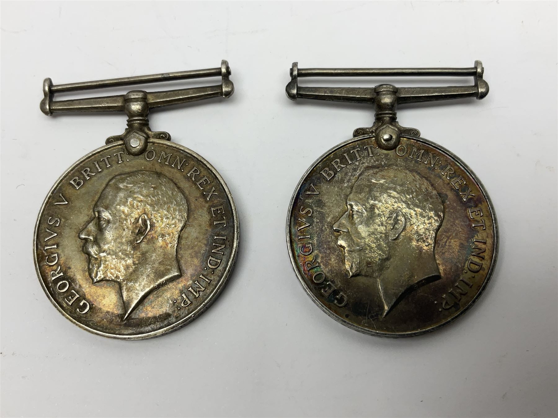 WW1 group of three medals comprising 1914-15 Star awarded to L-Cpl. W.J. Horspool R.War.R., British War Medal and Victory Medal awarded to A. Cpl. W.J. Horspool R.War.R.; WW1 British War Medal awarded to 3-8755 W.O.Cl.2. S. Paterson North'd Fus.; and hallmarked silver and enamel Northumberland Football Association Junior Cup Runners Up fob 1921-22 on silver chain (5)