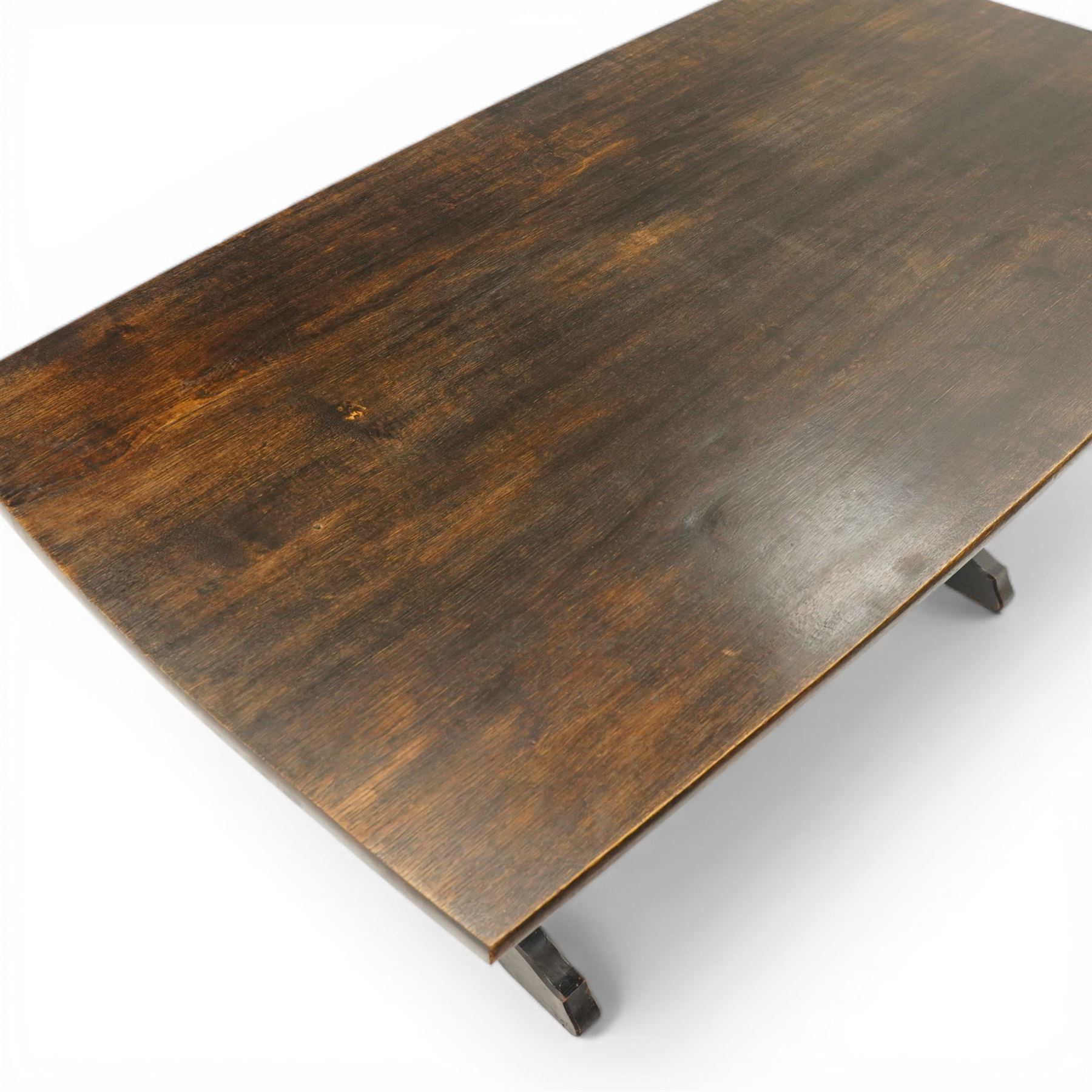 Acornman - dark stained oak dining table, rectangular top raised wishbone end supports united by stretcher, with carved acorn signature, by the workshop of Alan Grainger of Brandsby