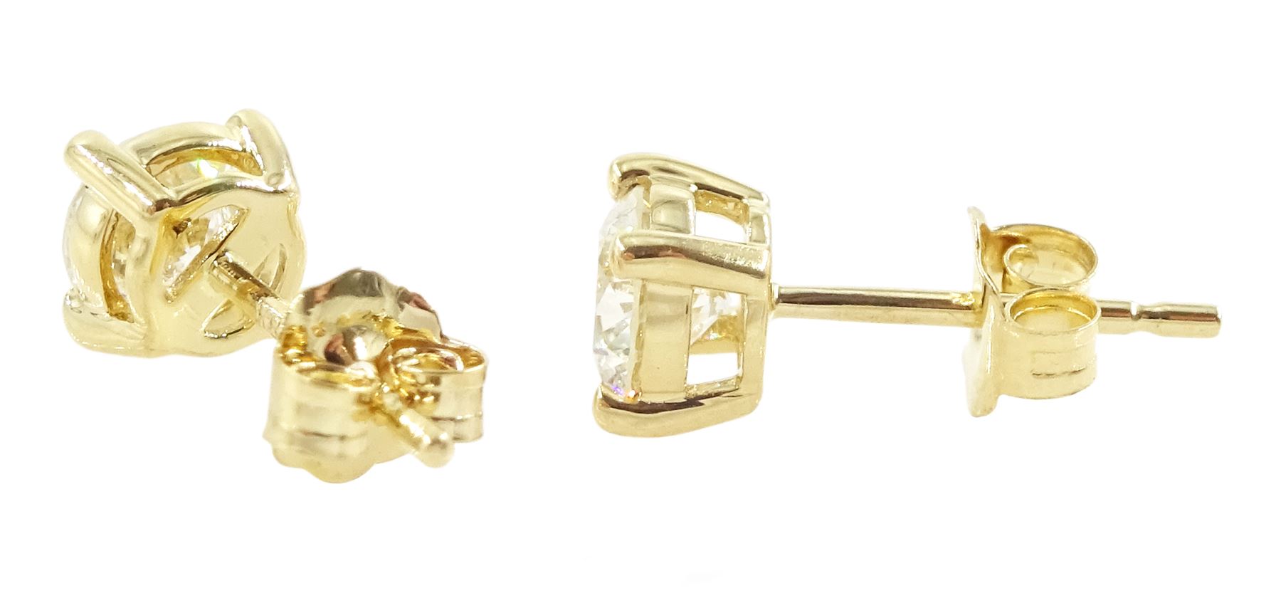 Pair of 18ct gold round brilliant cut diamond stud earrings, stamped, total diamond weight approx 0.80 carat