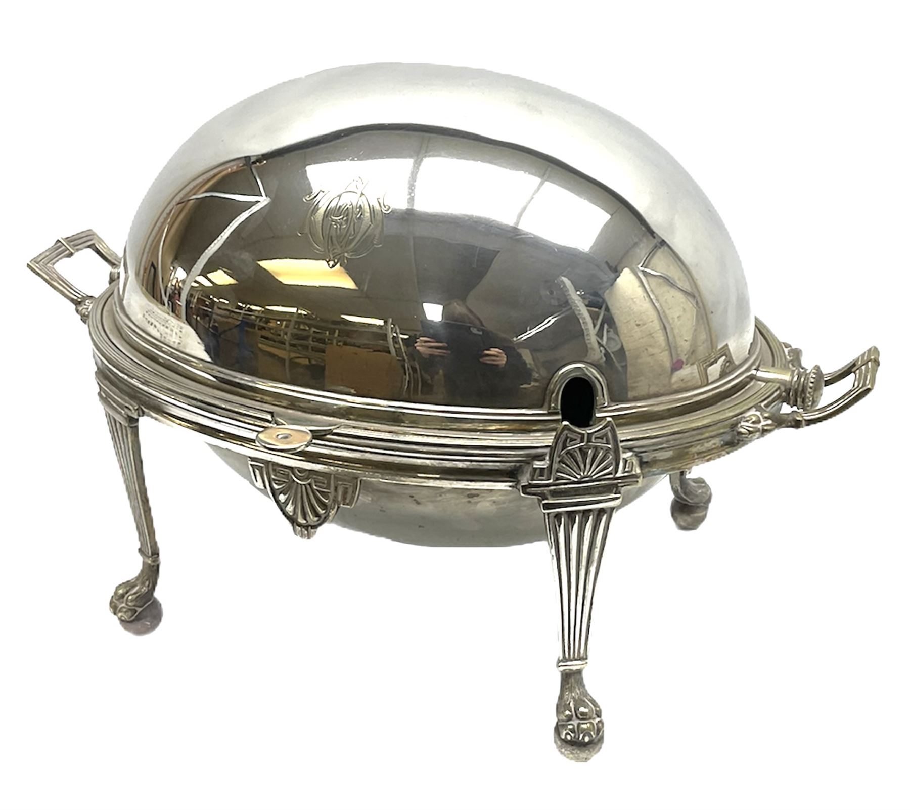 William Hutton & Sons silver plated entree dish, of oval form with twin handles, the revolving top with engraved monogram, upon four claw and ball feet, H22cm 