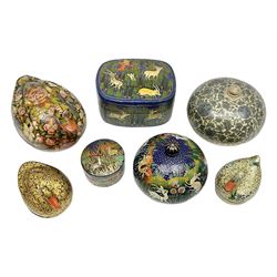 Seven lacquered boxes including russian examples decorated with running deer within a stylized landscapes, three novelty painted boxes in the form of a duck, etc, largest duck H10cm, L15cm