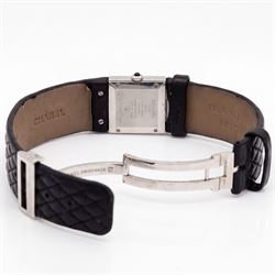 Chanel Matelassé ladies diamond stainless steel quartz wristwatch, black quilted dial, with round brilliant cut diamond bezel, back case No. 77835 and dated 2003, on quilted leather strap with fold-over-clasp 