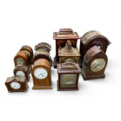Collection of mantle clock cases, some with movements 