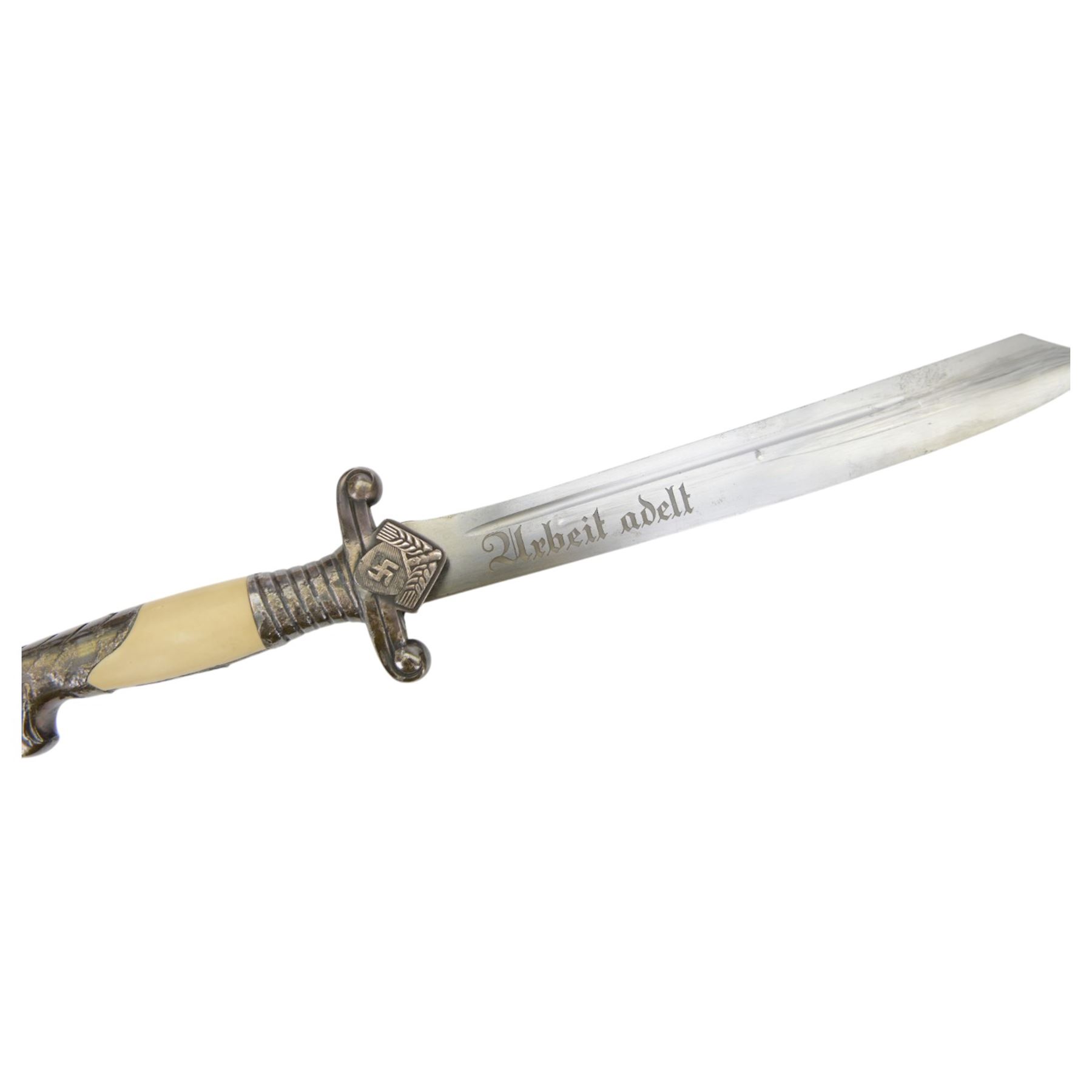 German Third Reich Officers dress hewer, the 26cm blade marked 'Urbeit adelt', the crossguard with RAD badge, ivorine grip and eagle head pommel, in engraved metal scabbard, overall L40cm