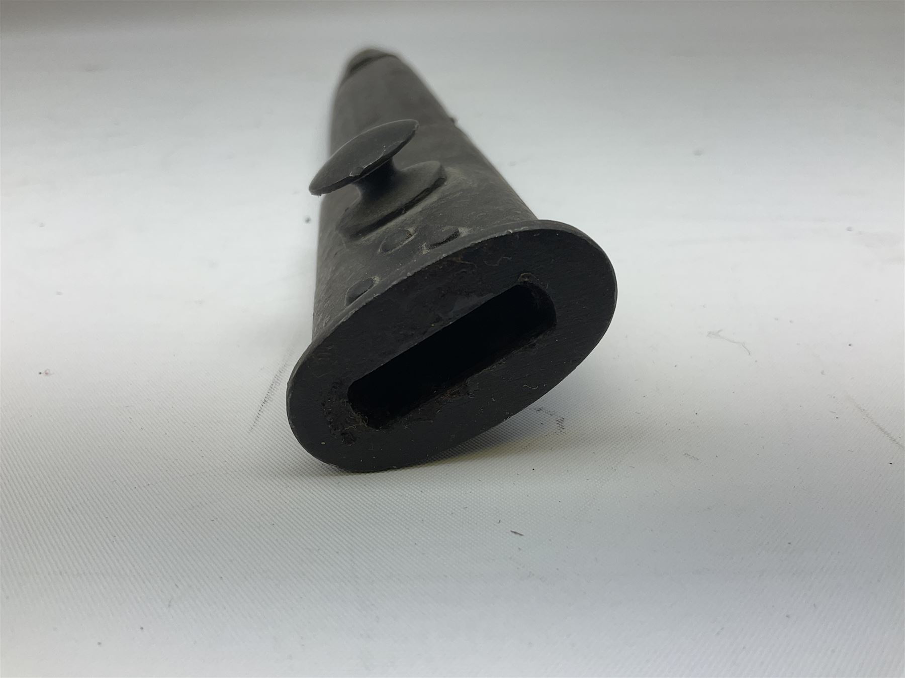 Australian Owen sub-machine gun bayonet, the 25.5cm fullered steel blade marked '53'; in metal bound wooden scabbard marled MA53 L41cm overall