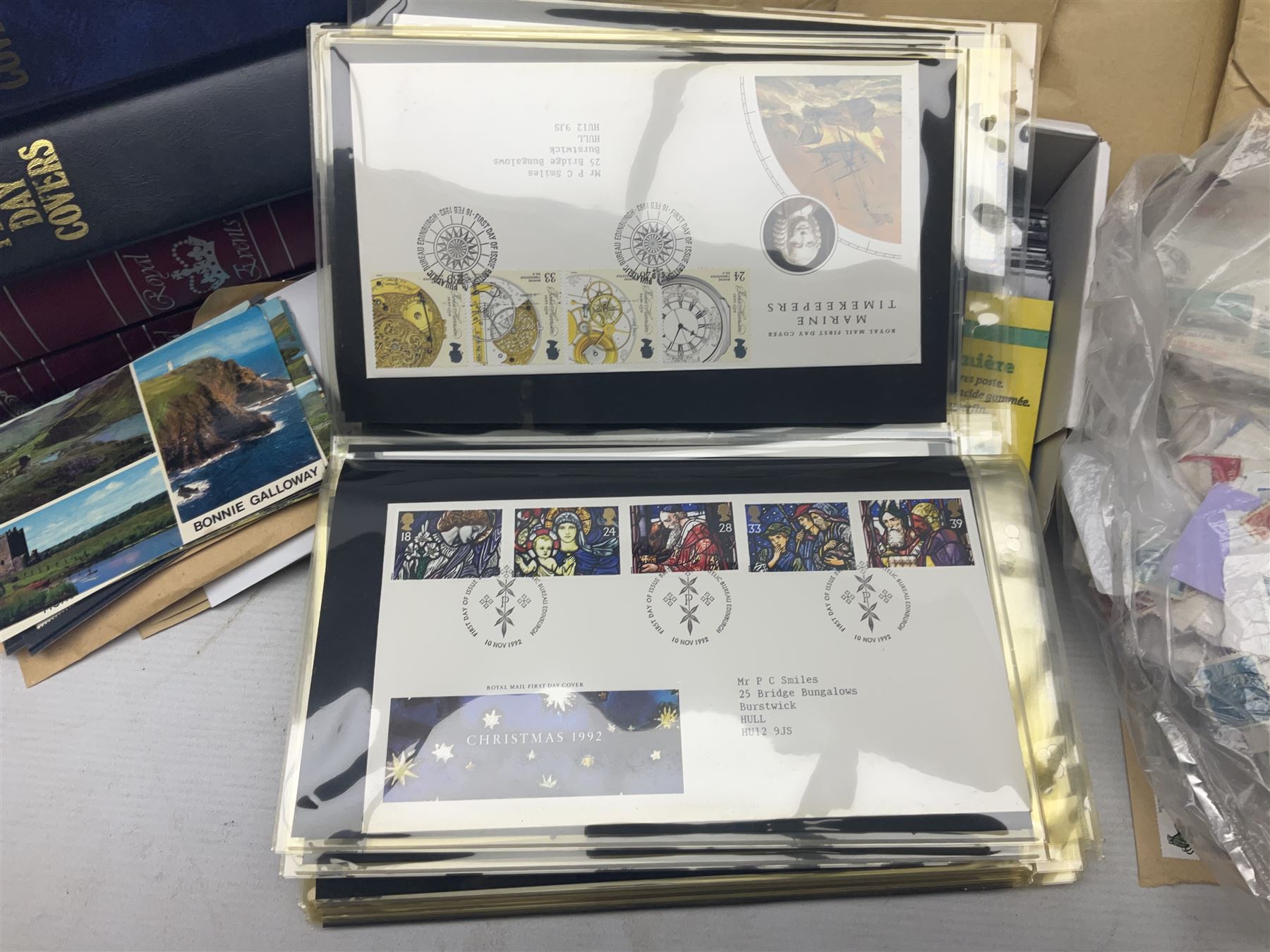 World stamps including Australia, Antigua, Canada, New Zealand, St Vincent, Republic of Maldives, Norfolk Island, Malta etc, Great British and other first day covers, Queen Elizabeth II 60th Birthday commemorative stamps etc, housed in five albums/folders and loose, in one box