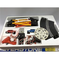 Scalextric - Silverstone Set still in factory sealed transparent packaging and box; and Banger Raceway Set with folding cardboard pit stop, boxed (2)