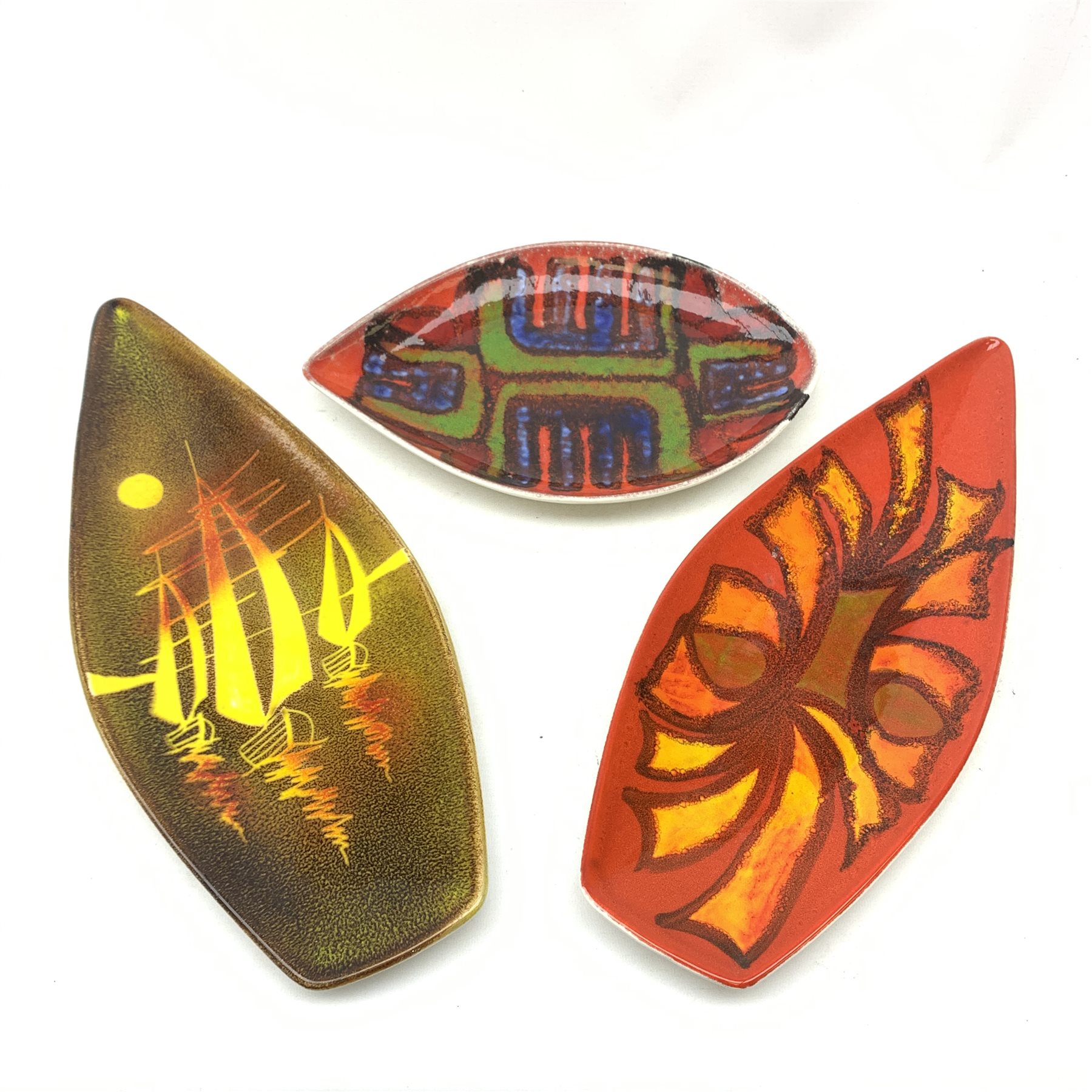 A Poole Pottery Aegean spear dish, together with a Delphis example, each shape 82, largest L44cm, and a Poole Delphis tear plate, shape 91, L30.5cm, each with printed mark beneath.