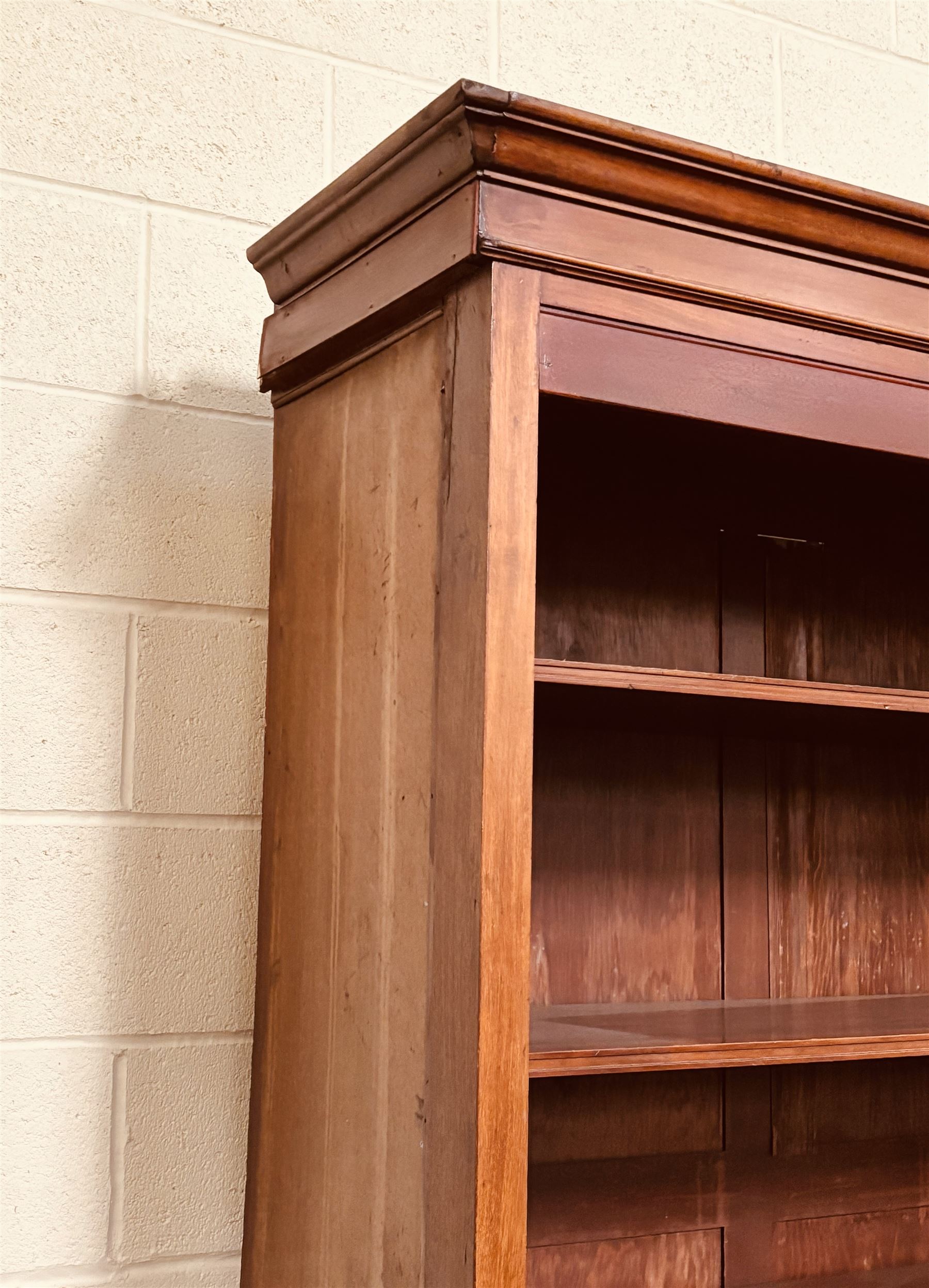 Large mahogany haberdashery cabinet shop fitting, early 20th century and later, the top section fitted with nine shelves, above nine deep drawers sliding out on rollers, on a skirted base. Disassembles for transport. H237cm, L373cm, D95cm.  - COLLECTION BY APPOINTMENT FROM: The White House, Thirsk Road, Easingwold, York, YO61 3NF - CALL 01723 507111 TO ARRANGE